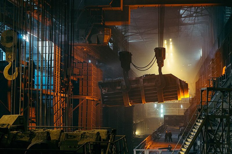 Steel mill interior with overhead crane